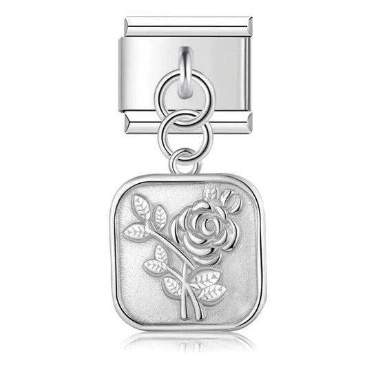 A Rose, Hanging, on Silver