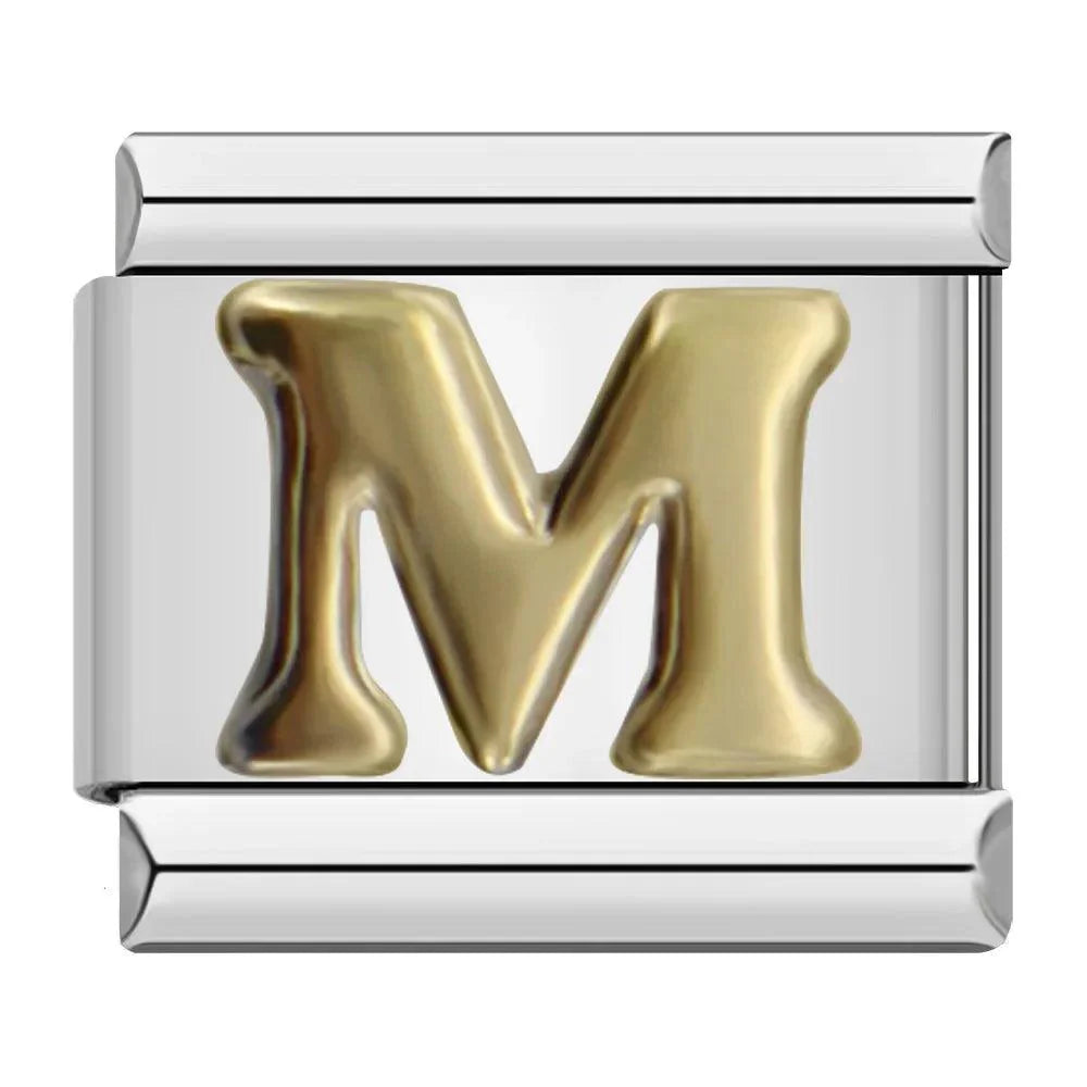 Letter M in Gold, on Silver